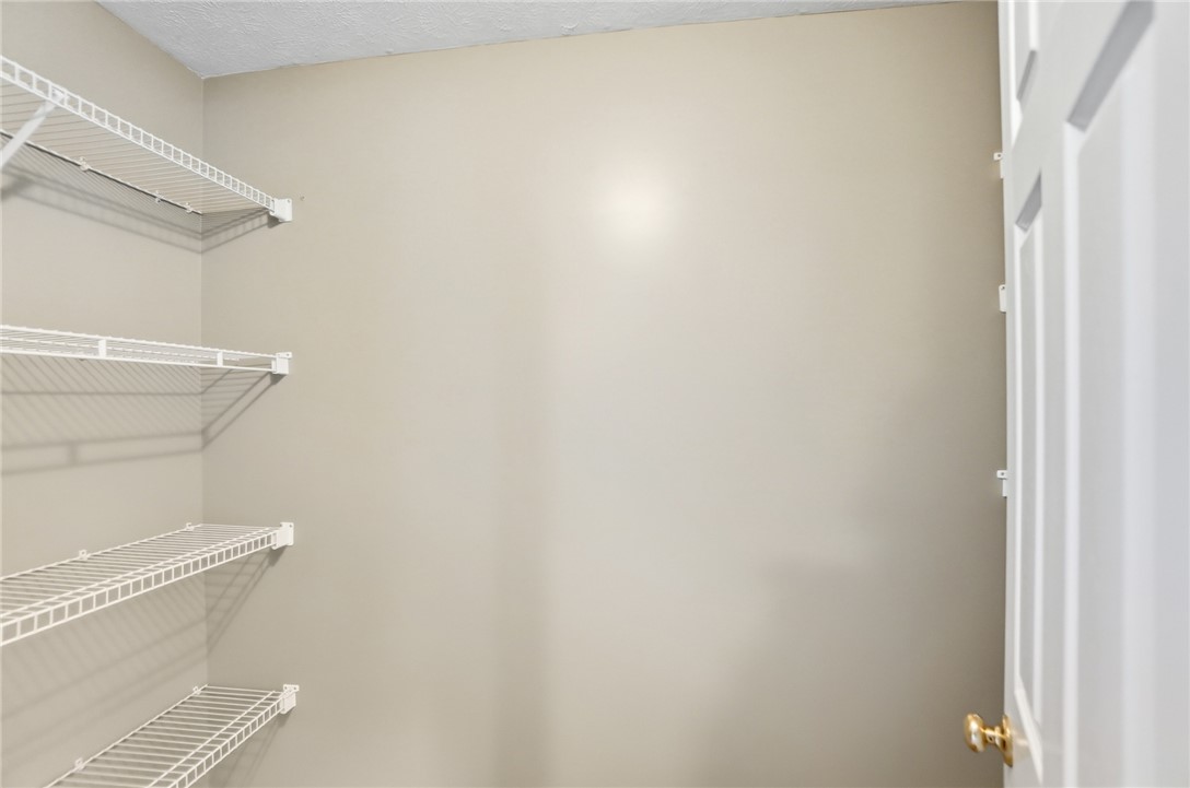 10 Chase Court Springboro, OH 45066 - Photo 48 of 75 This organized closet offers ample shelving for convenient storage solutions.