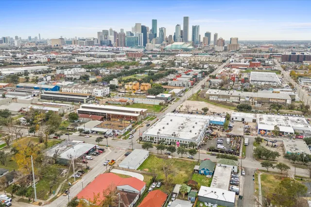 an aerial view of a city with lots of residential buildings