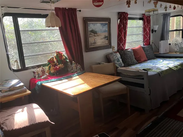 a kitchen with stainless steel appliances granite countertop a stove and cabinets