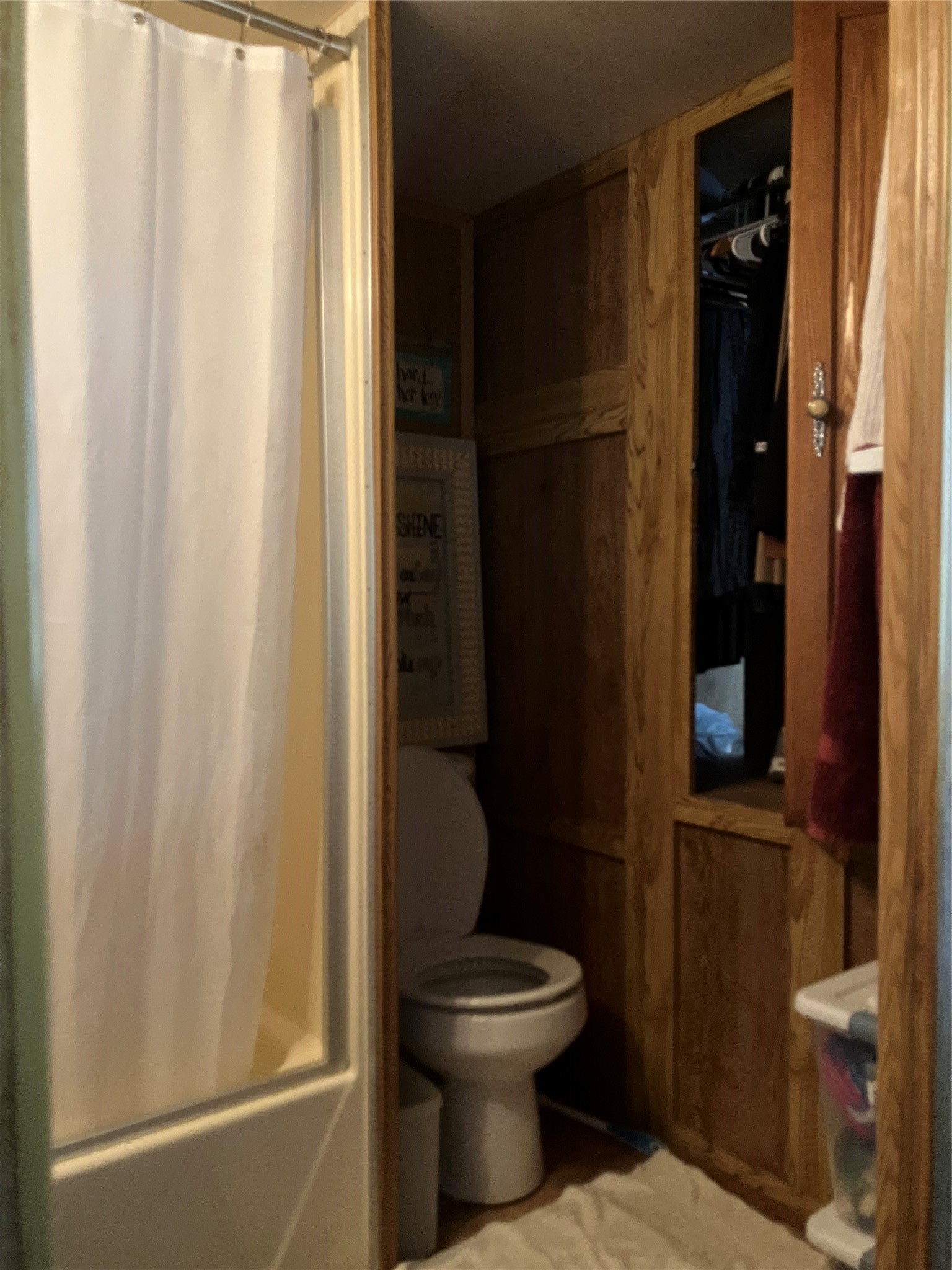 242 Elm Trail Trinity, TX 75862 - Photo 15 of 28 a bathroom with a toilet and a shower