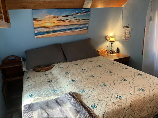 a view of a swimming pool with an outdoor space and seating area