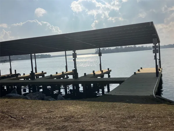 a view of a swimming pool with an outdoor space and seating area