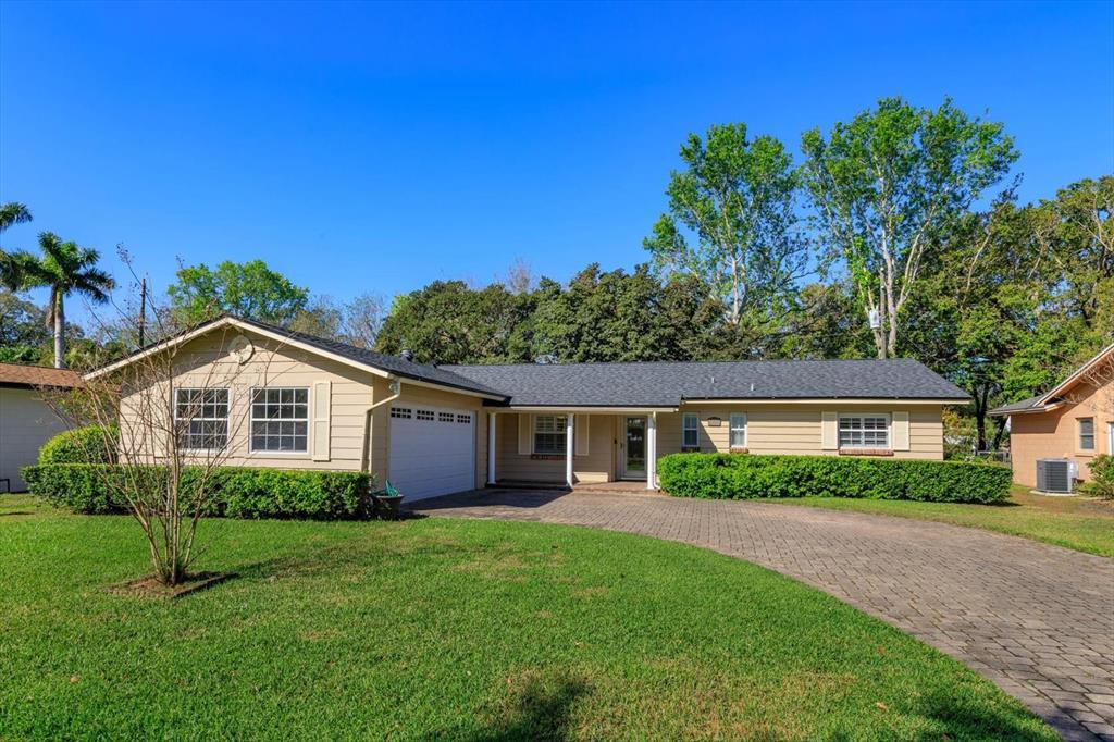519 Cornwall Road Winter Park, FL 32792 - Photo 1 of 1 Front of home with paver driveway