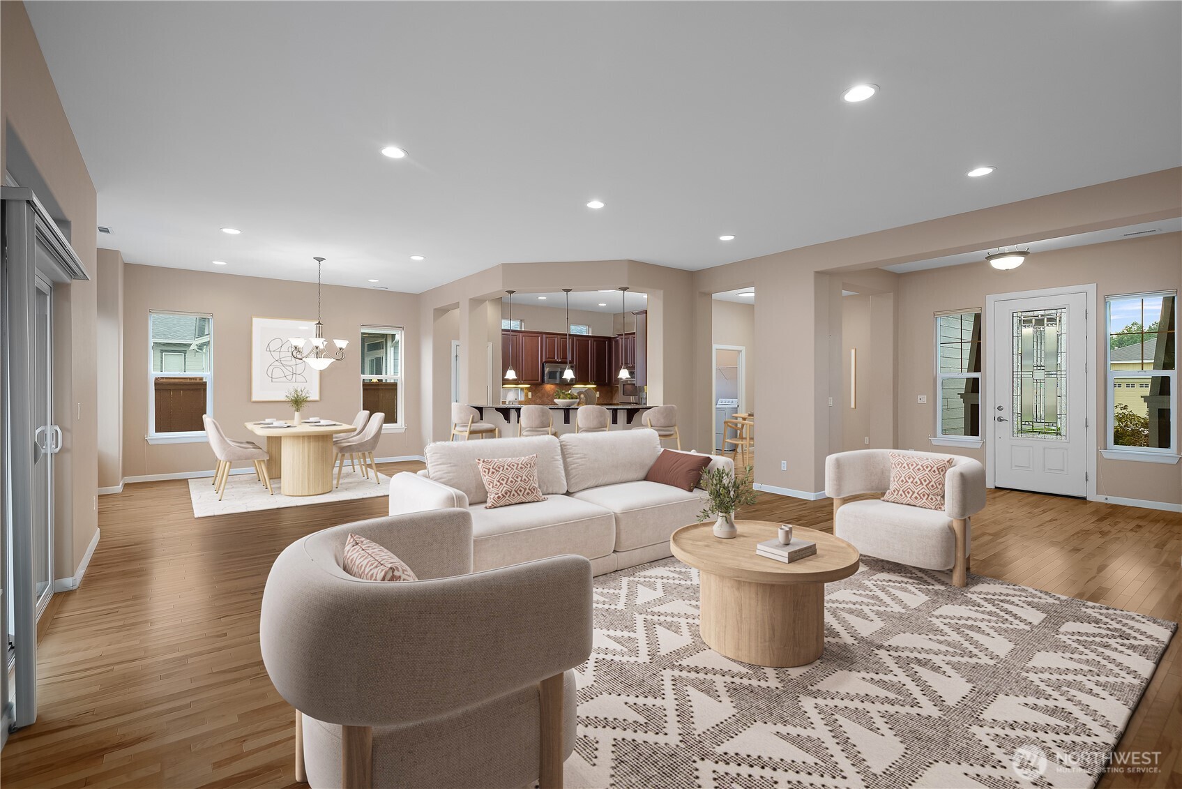 a living room with furniture and wooden floor