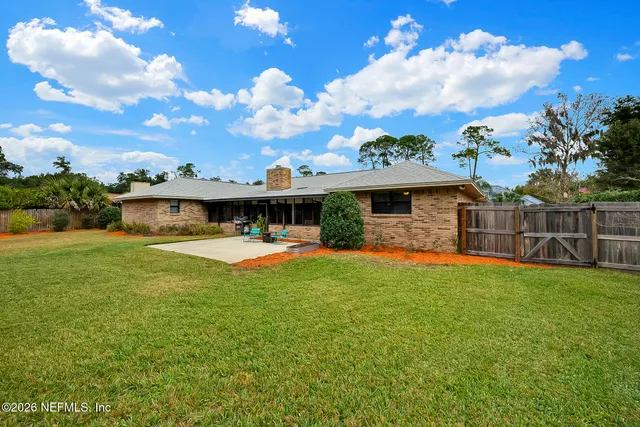front view of a house with a big yard