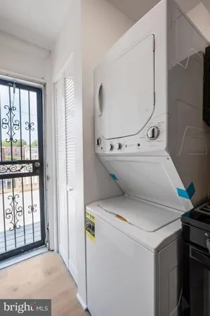 a kitchen with a stove and a microwave
