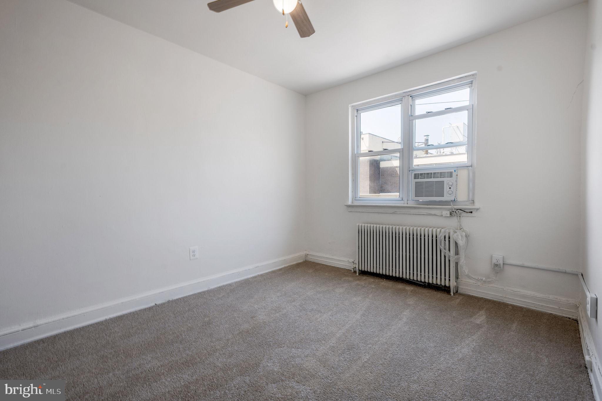 2538 9th Street Northwest, Unit B Washington, DC 20001 - Photo 15 of 19 an empty room with a window