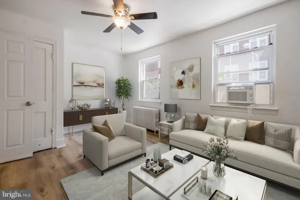 a bathroom with a sink toilet and mirror