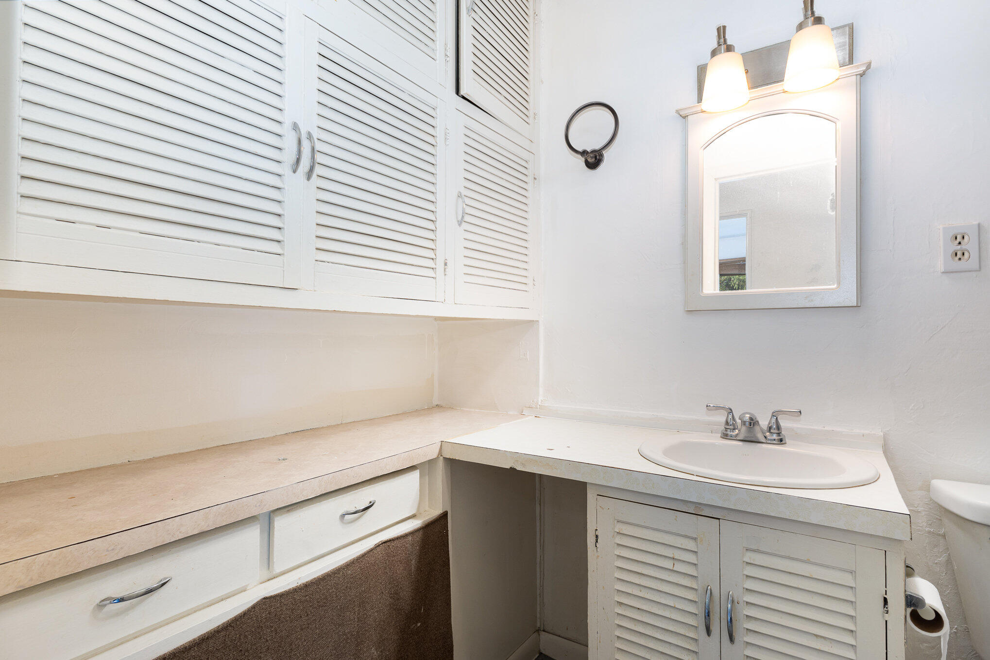 2108 Pear Street Michigan City, IN 46360 - Photo 14 of 25 a bathroom with a sink and a mirror