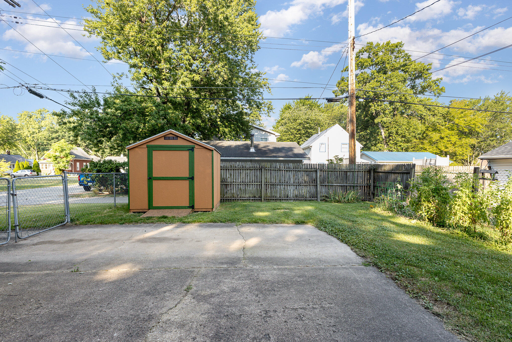 2108 Pear Street Michigan City, IN 46360 - Photo 23 of 25 a backyard of a house with lots of green space