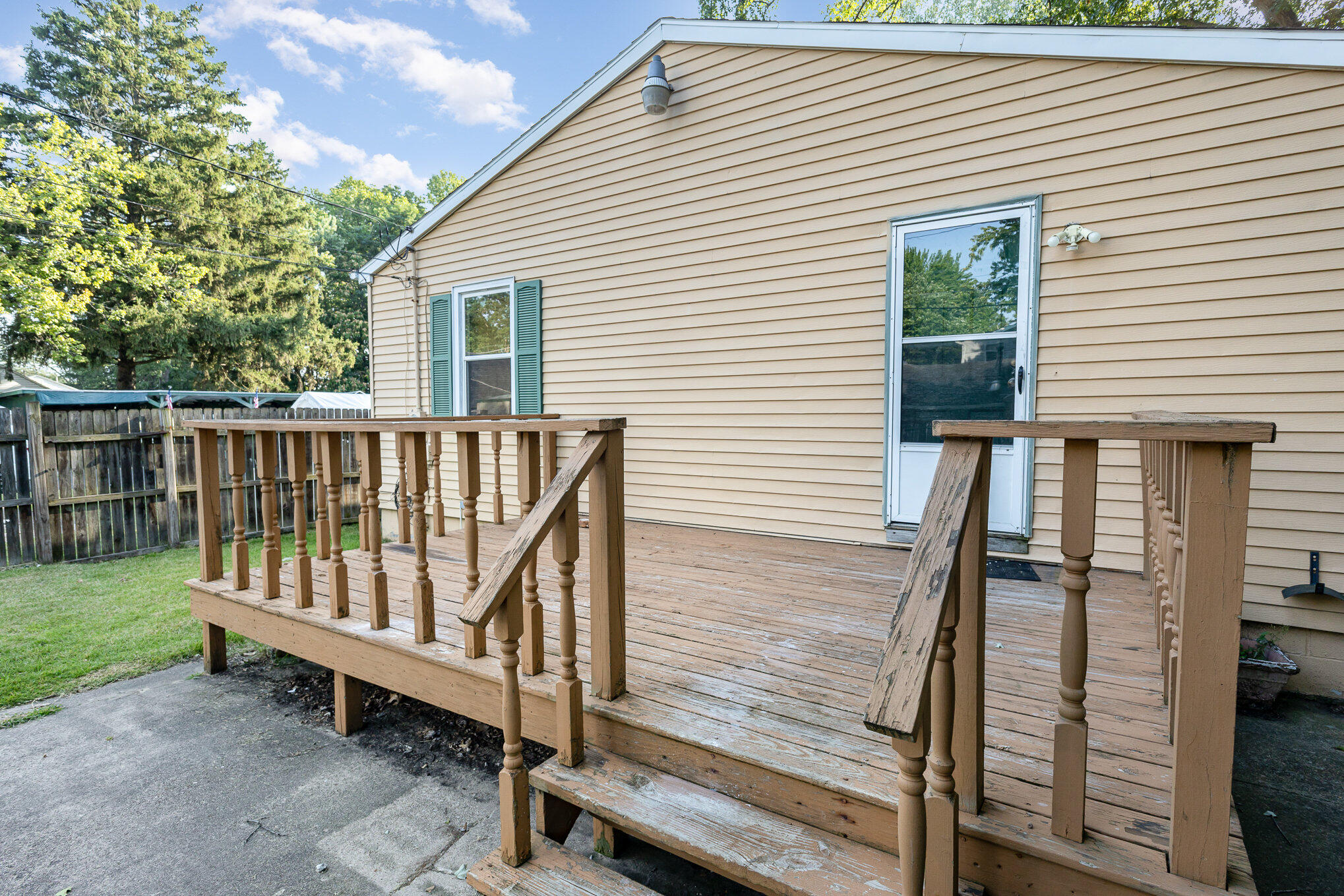 2108 Pear Street Michigan City, IN 46360 - Photo 24 of 25 a view of a wooden deck and a backyard