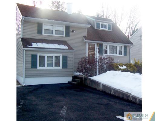 198 McFarlane Road Colonia, NJ 07067 - Photo 1 of 22 a house view with a outdoor space