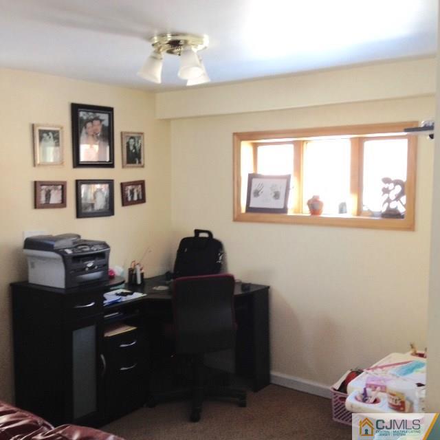 198 McFarlane Road Colonia, NJ 07067 - Photo 11 of 22 a room with a workspace