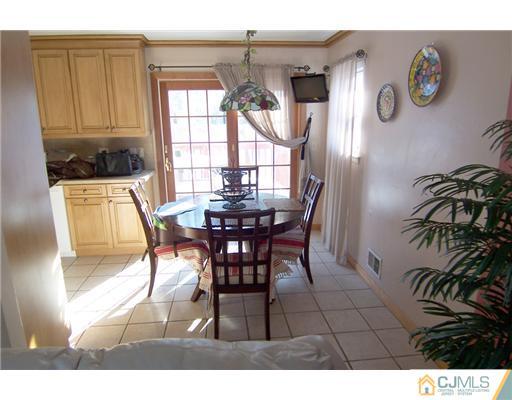 198 McFarlane Road Colonia, NJ 07067 - Photo 6 of 22 a dining room with furniture and window