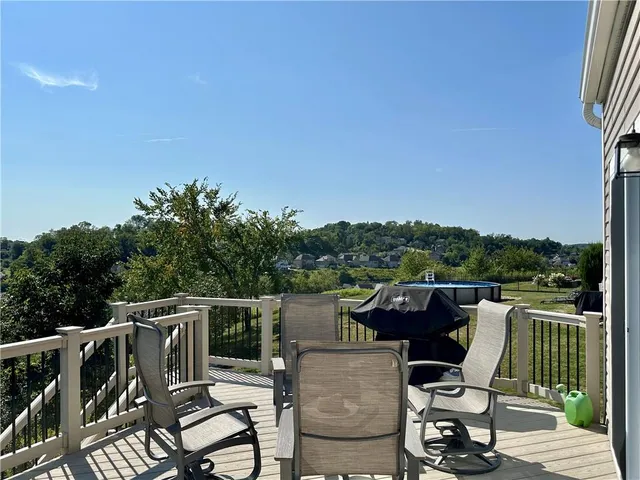 a view of a chairs and table on the terrace