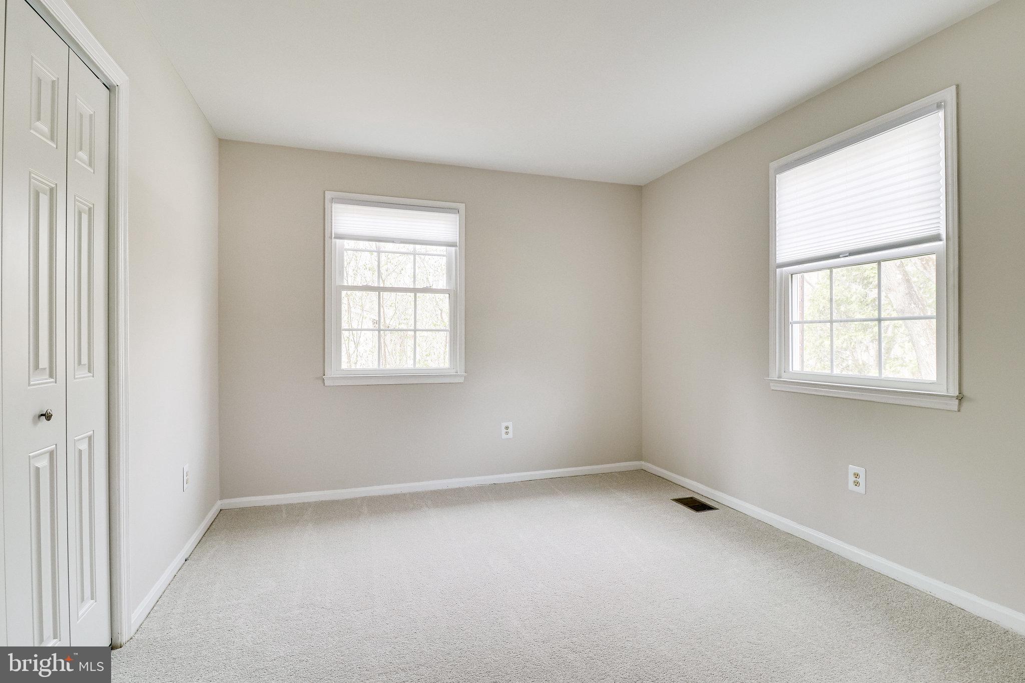 6951 Cottontail Court Springfield, VA 22153 - Photo 34 of 72 Two walls off windows in the third bedroom