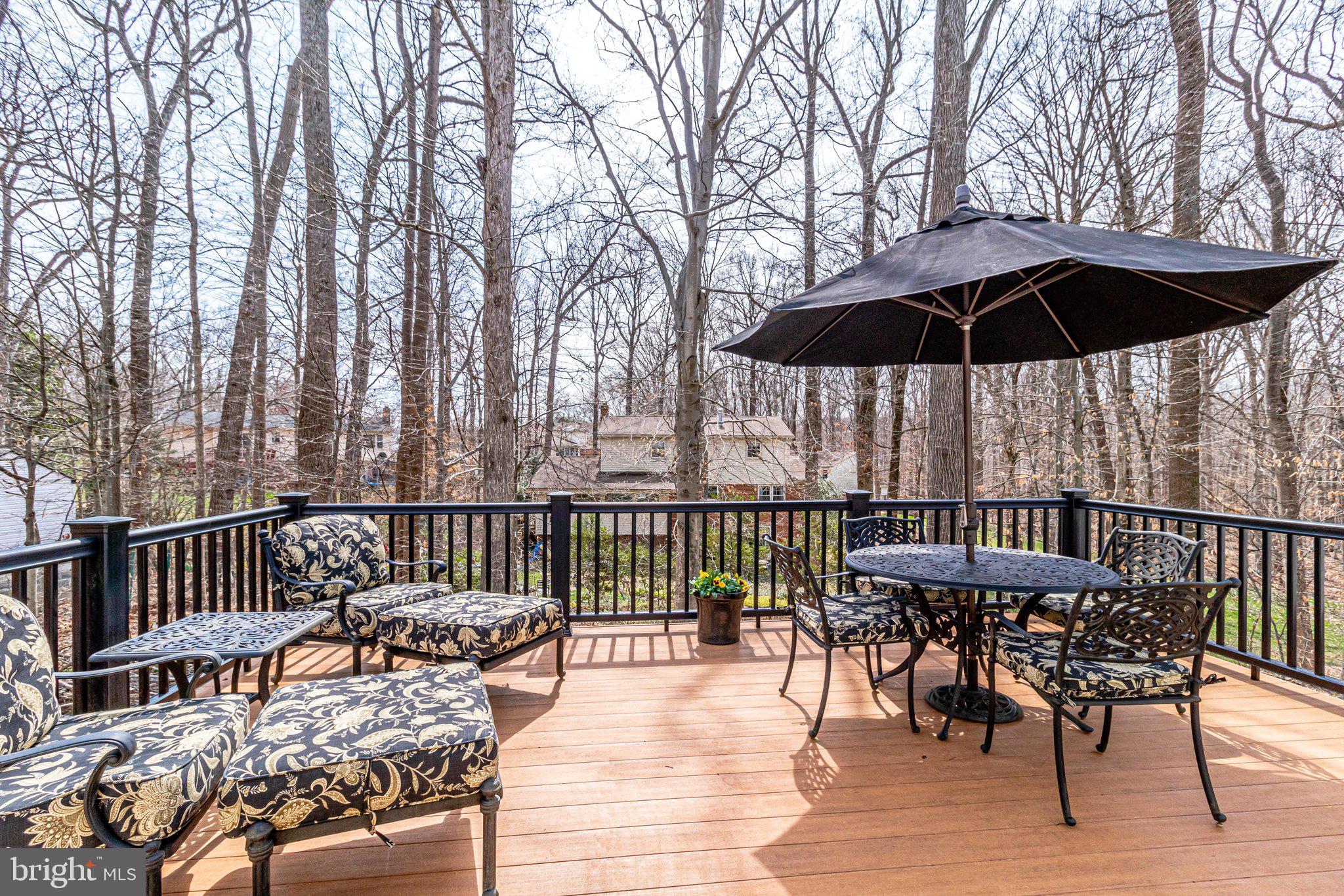 6951 Cottontail Court Springfield, VA 22153 - Photo 57 of 72 Teak colored deck off the kitchen