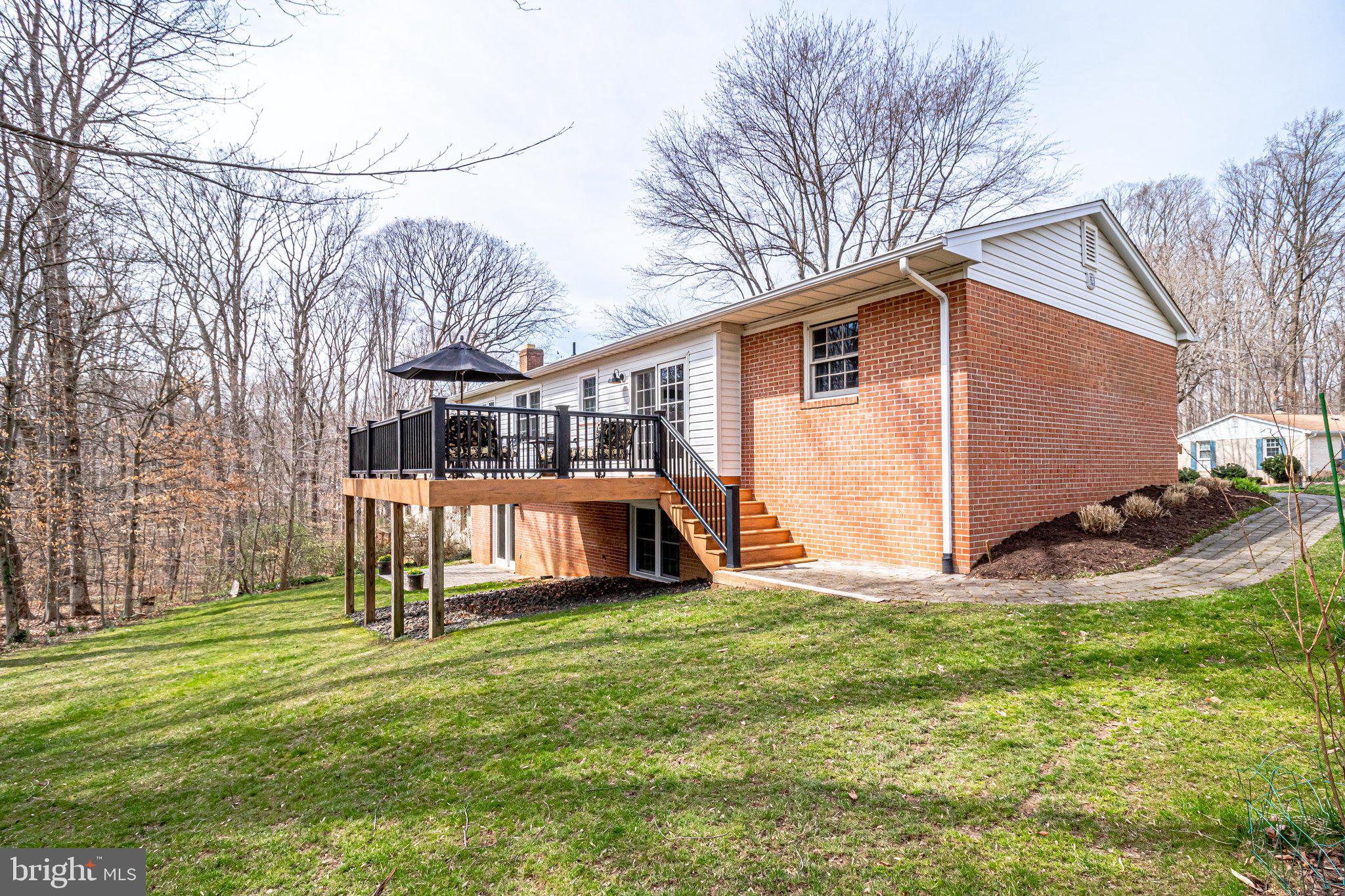 6951 Cottontail Court Springfield, VA 22153 - Photo 67 of 72 Steps leading down from the deck to the back yard