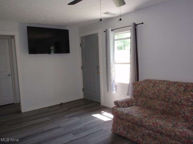 14203 Darrow Road Vermilion, OH 44089 - Photo 2 of 26 Living room featuring wood finished floors and a ceiling fan