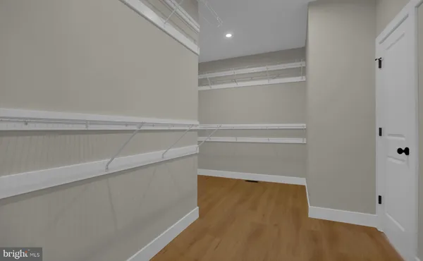 a view of small space with racks on the wall