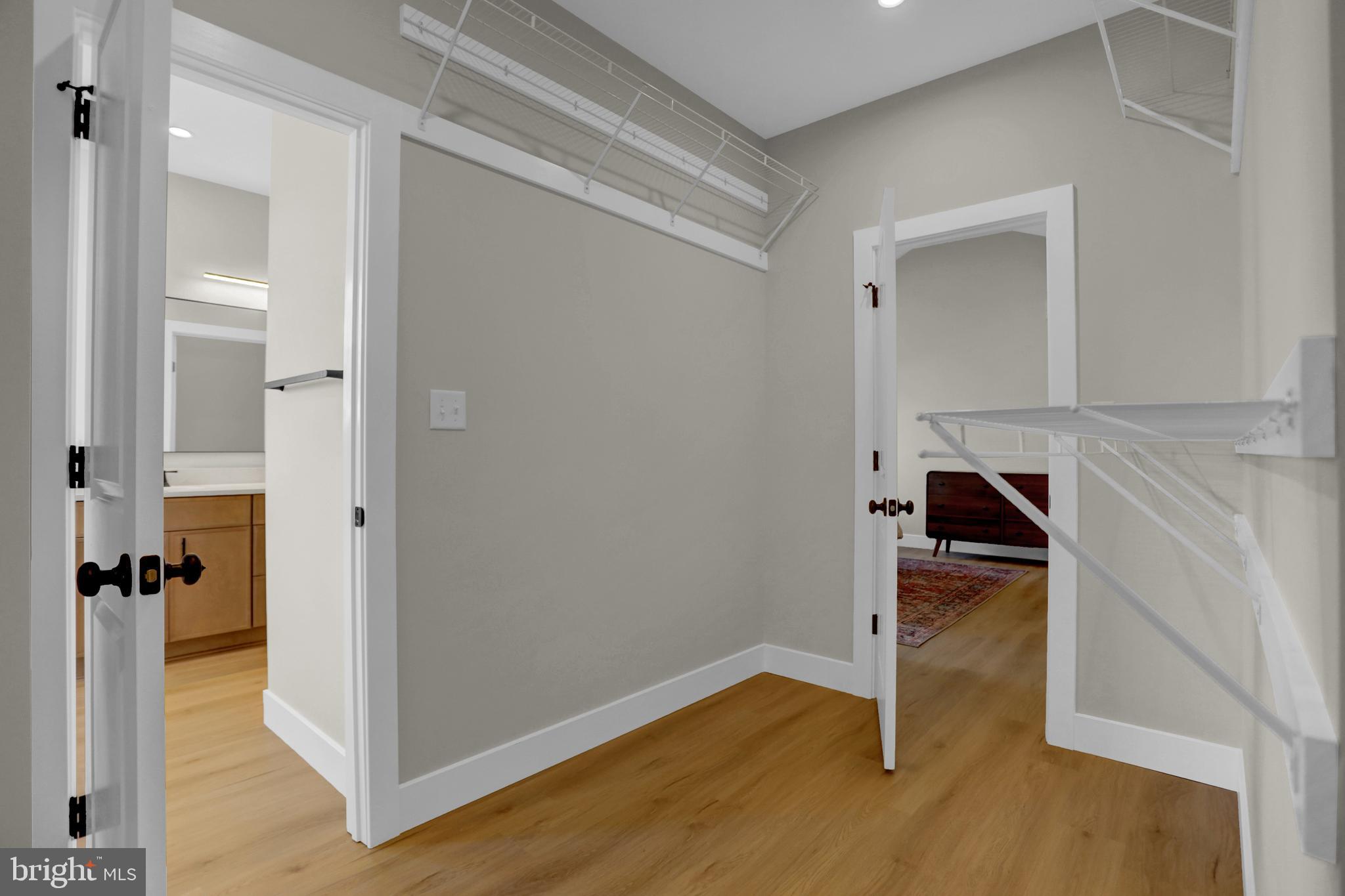 3542 Revolea Beach Road Middle River, MD 21220 - Photo 21 of 28 a view of room with wooden floor and chair