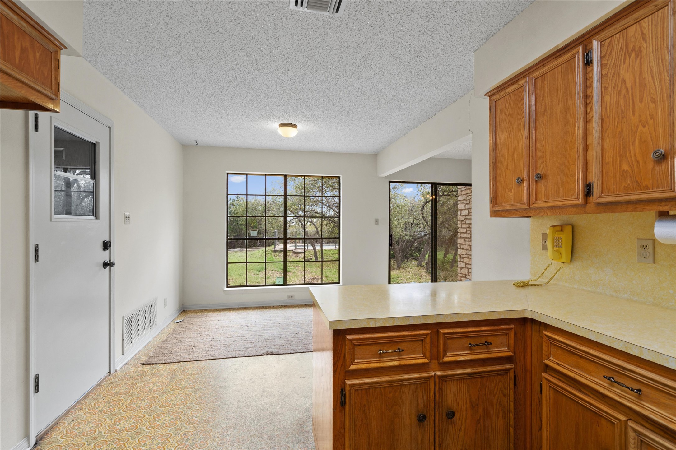 422 Patricia Road Georgetown, TX 78628 - Photo 13 of 39 a kitchen with a sink and large window