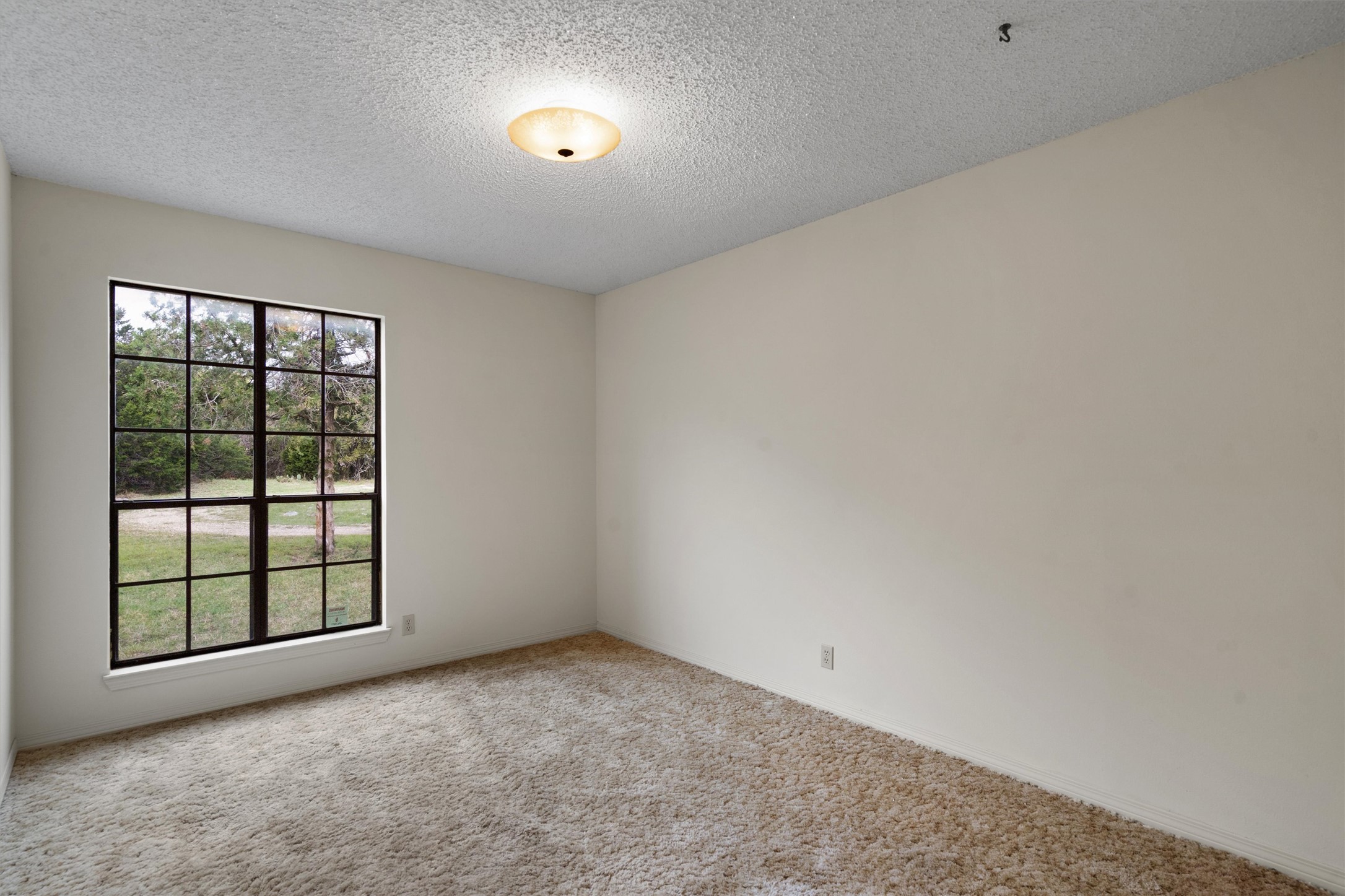 422 Patricia Road Georgetown, TX 78628 - Photo 18 of 39 an empty room with windows