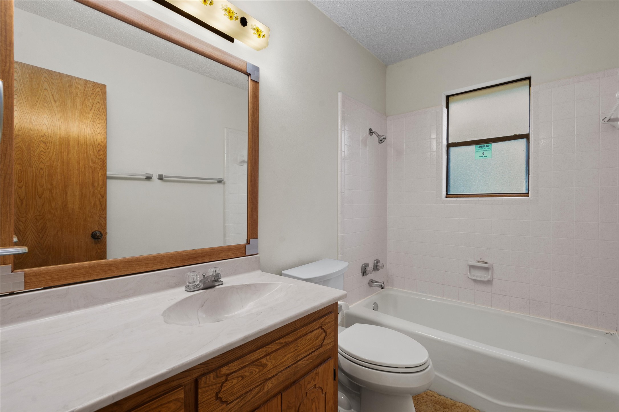 422 Patricia Road Georgetown, TX 78628 - Photo 22 of 39 a bathroom with a sink a toilet and shower