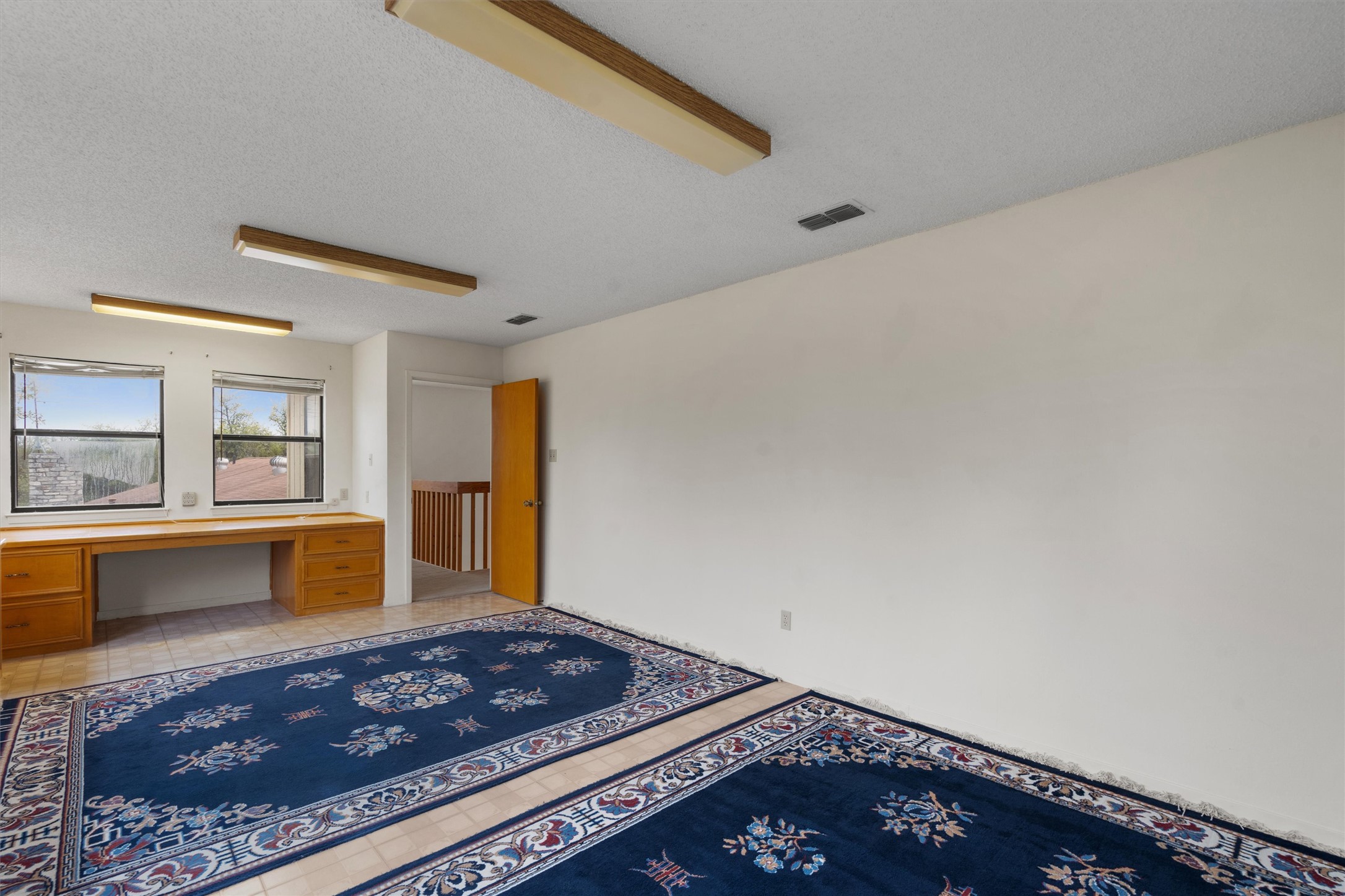 422 Patricia Road Georgetown, TX 78628 - Photo 26 of 39 a living room with a rug
