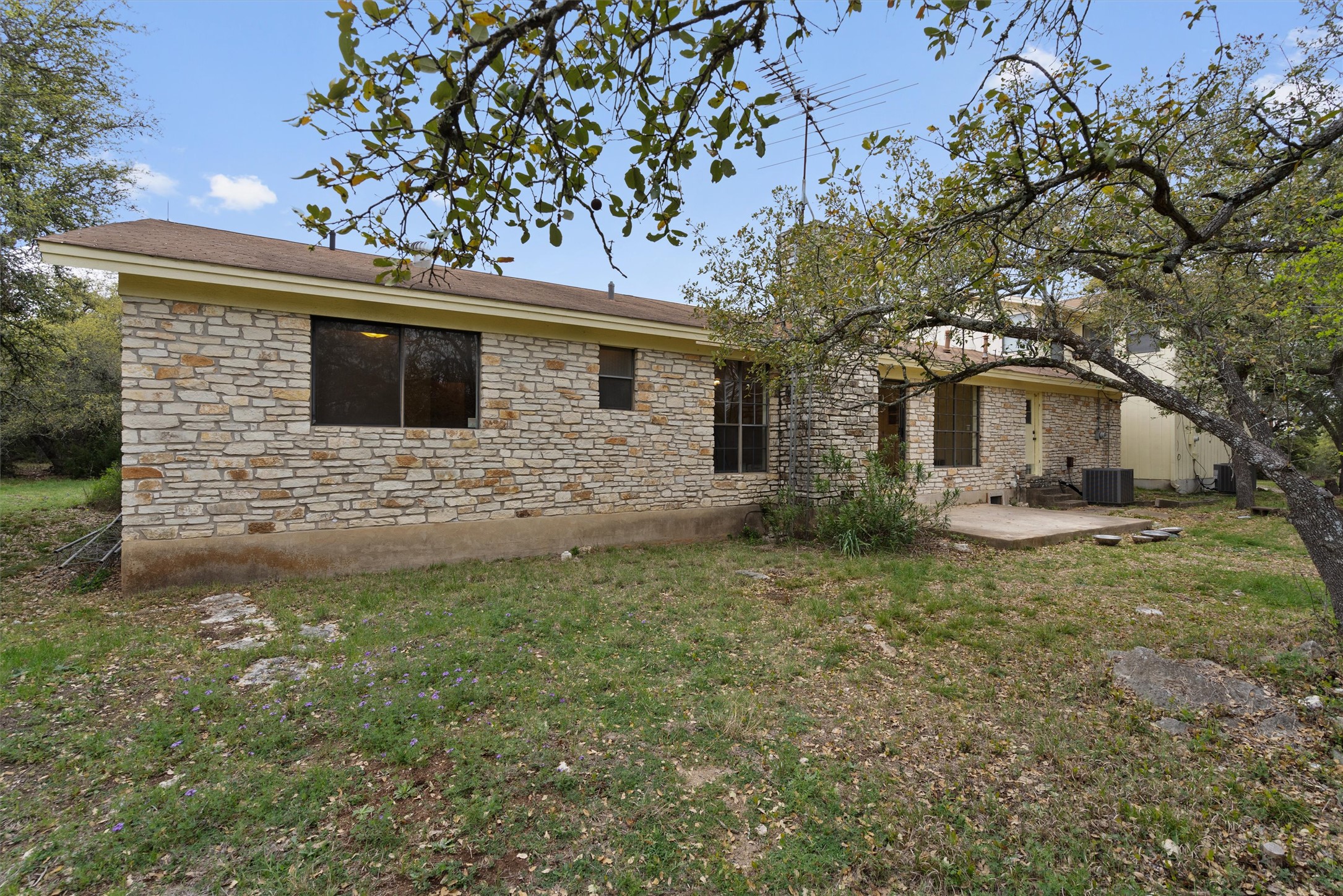422 Patricia Road Georgetown, TX 78628 - Photo 34 of 39 a front view of a house with garden