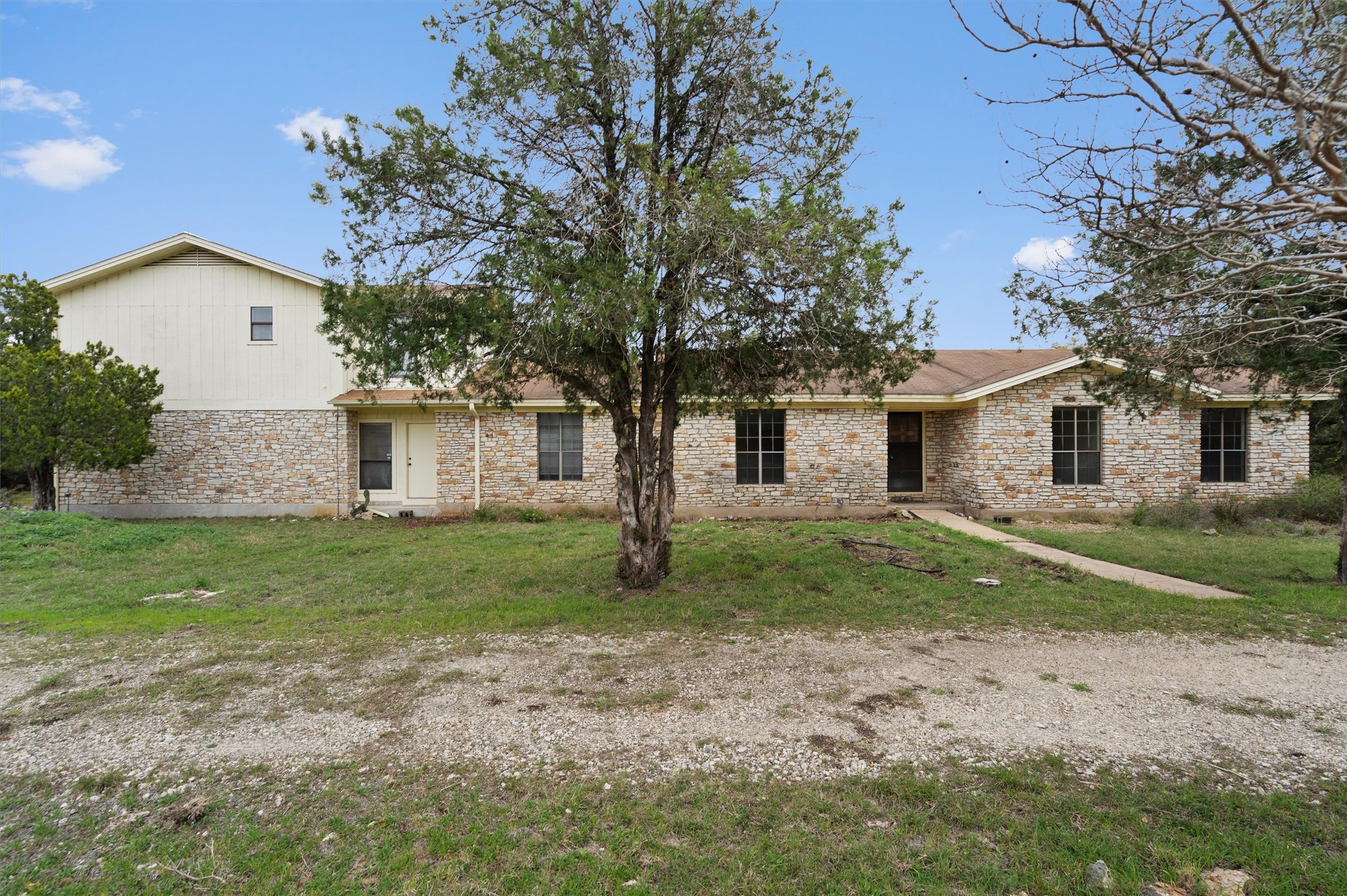 422 Patricia Road Georgetown, TX 78628 - Photo 4 of 39 a view of a house with yard and a tree
