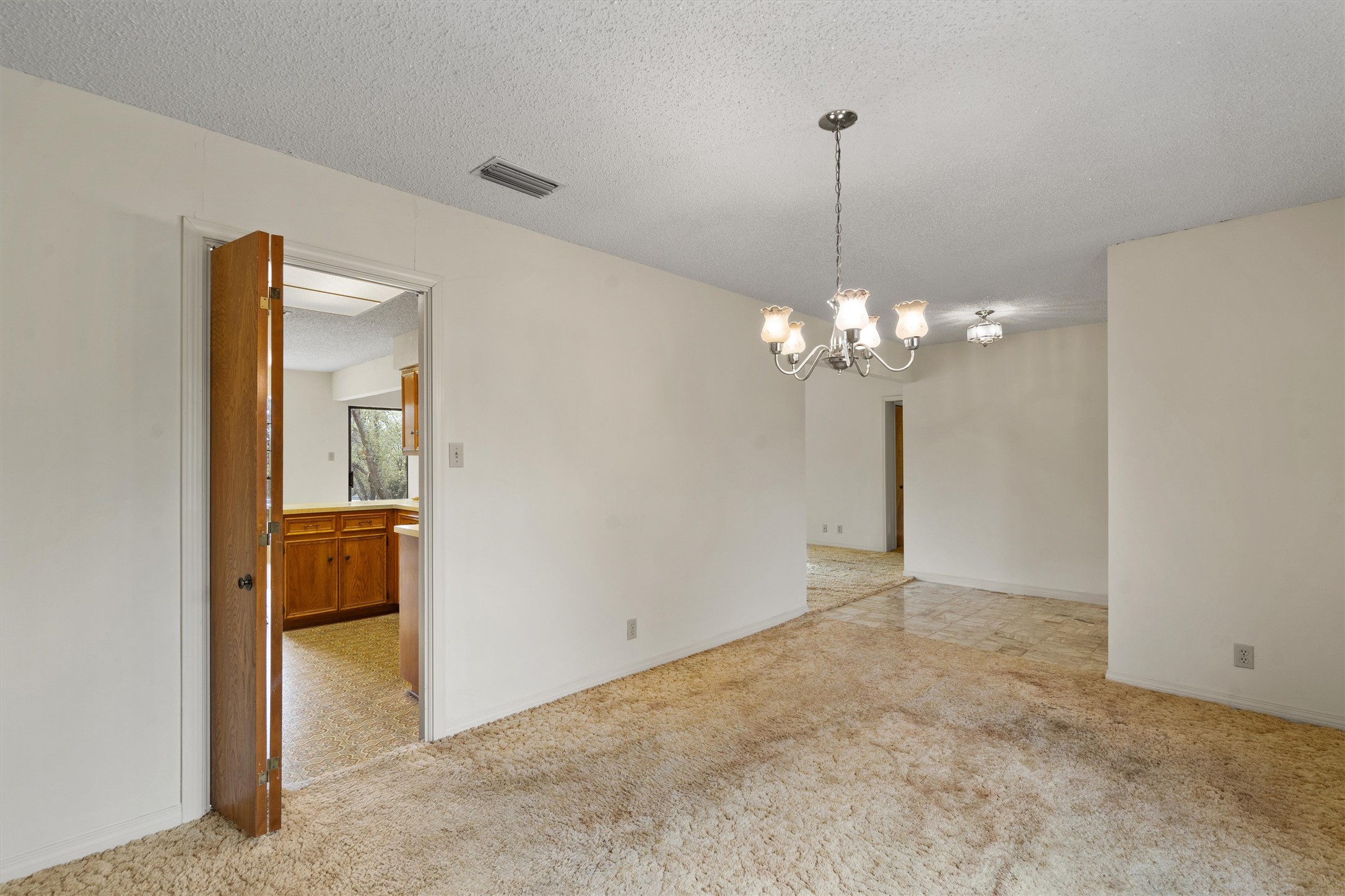 422 Patricia Road Georgetown, TX 78628 - Photo 9 of 39 a view of a chandelier in big room and chandelier