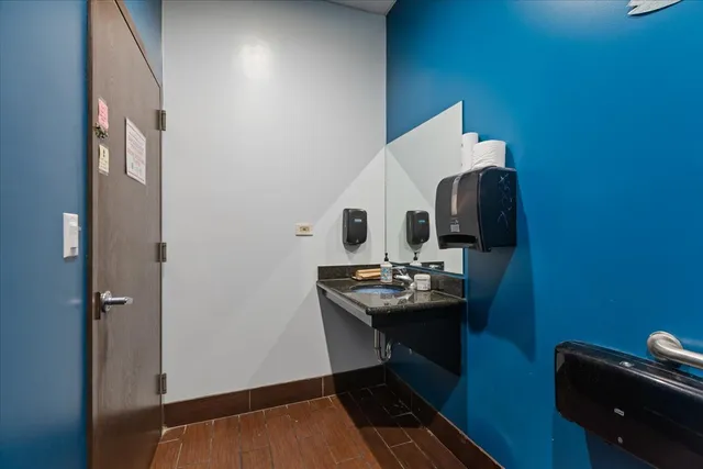 a room with furniture and wooden floor