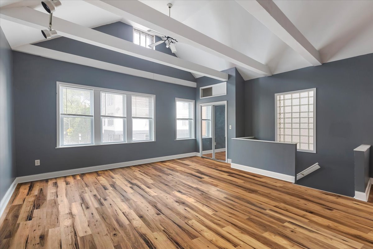 2062 North Damen Avenue Chicago, IL 60647 - Photo 4 of 26 a view of an empty room and window