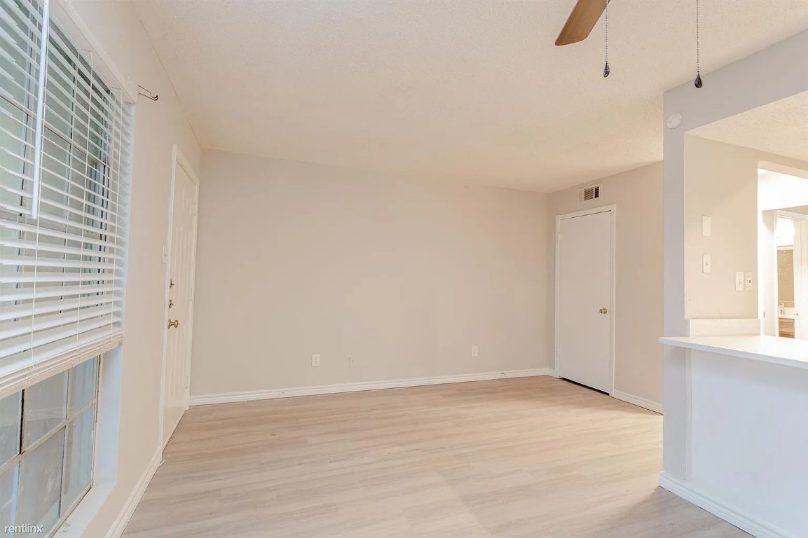 4501 Witham Lane, Unit 106 Austin, TX 78745 - Photo 1 of 11 a view of an empty room with a window