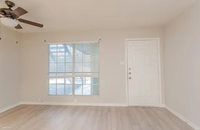 an empty room with a window