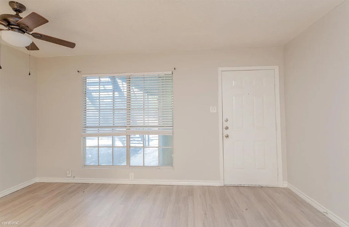 4501 Witham Lane, Unit 106 Austin, TX 78745 - Photo 2 of 11 an empty room with a window