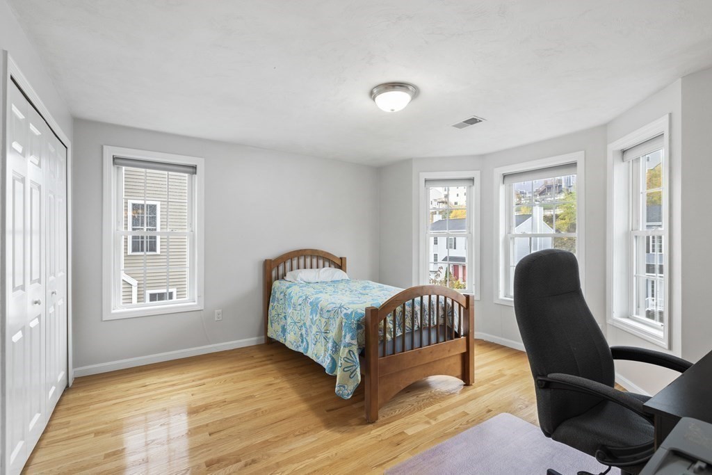 21 Honeysuckle Road Worcester, MA 01607 - Photo 27 of 38 a view of a livingroom with furniture and a window