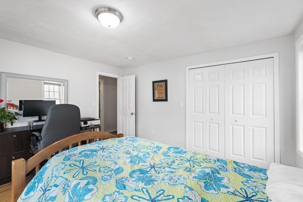 21 Honeysuckle Road Worcester, MA 01607 - Photo 28 of 38 a bedroom with bed and furniture