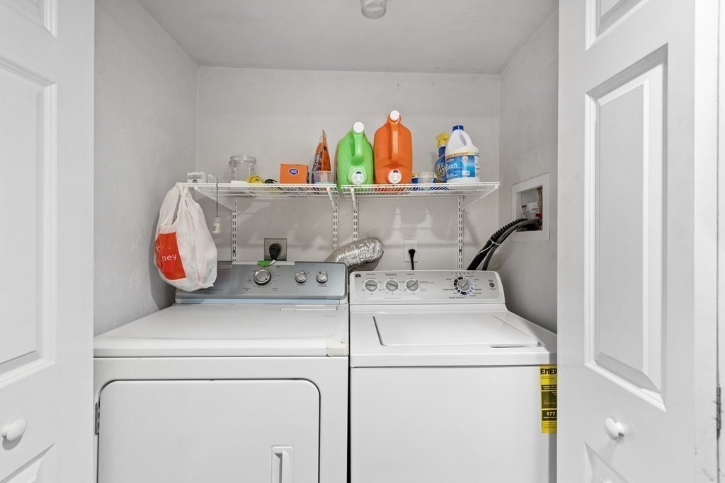 21 Honeysuckle Road Worcester, MA 01607 - Photo 29 of 38 a utility room with dryer and washer