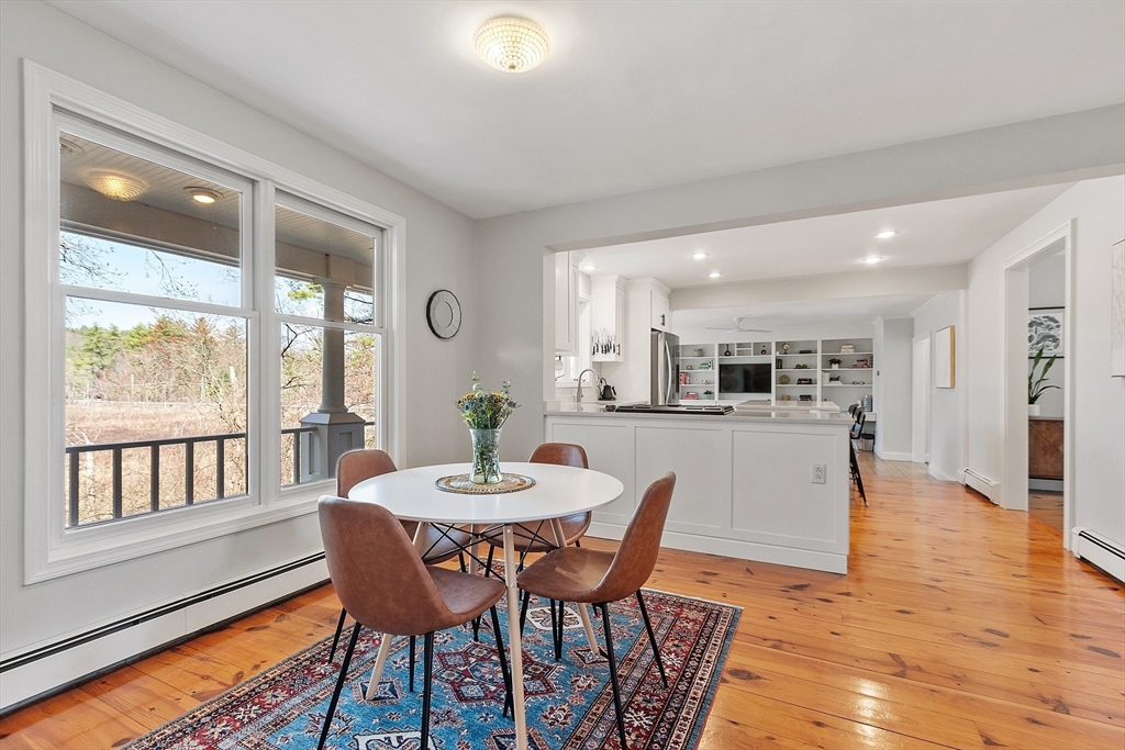 4 Willow Road Harvard, MA 01451 - Photo 11 of 42 a view of a dining room with furniture window and wooden floor