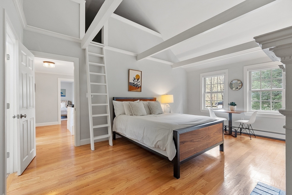 4 Willow Road Harvard, MA 01451 - Photo 20 of 42 a bedroom with a bed and a large window