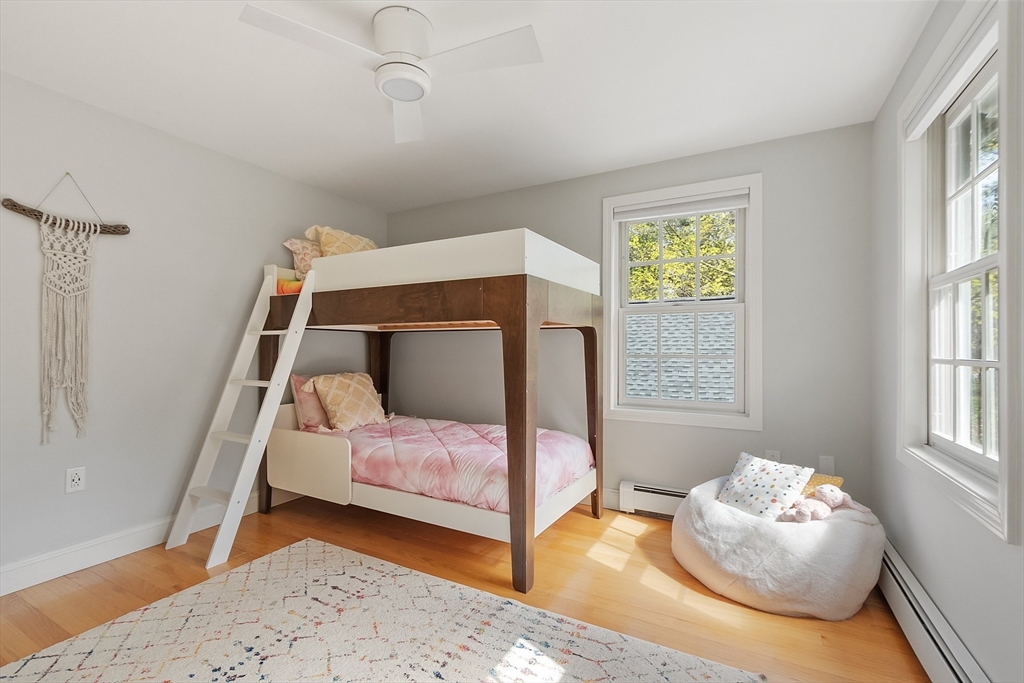 4 Willow Road Harvard, MA 01451 - Photo 27 of 42 a bedroom with a bed and window