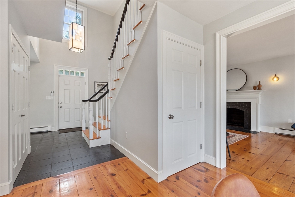 4 Willow Road Harvard, MA 01451 - Photo 5 of 42 a view of entryway and hall with wooden floor