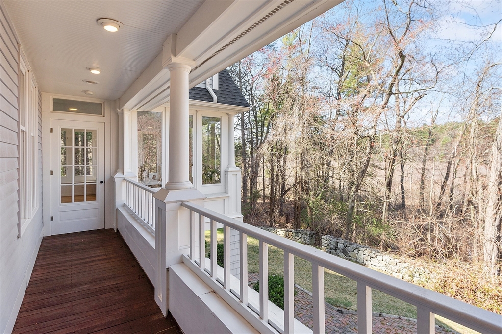 4 Willow Road Harvard, MA 01451 - Photo 10 of 42 a view of a balcony with wooden floor