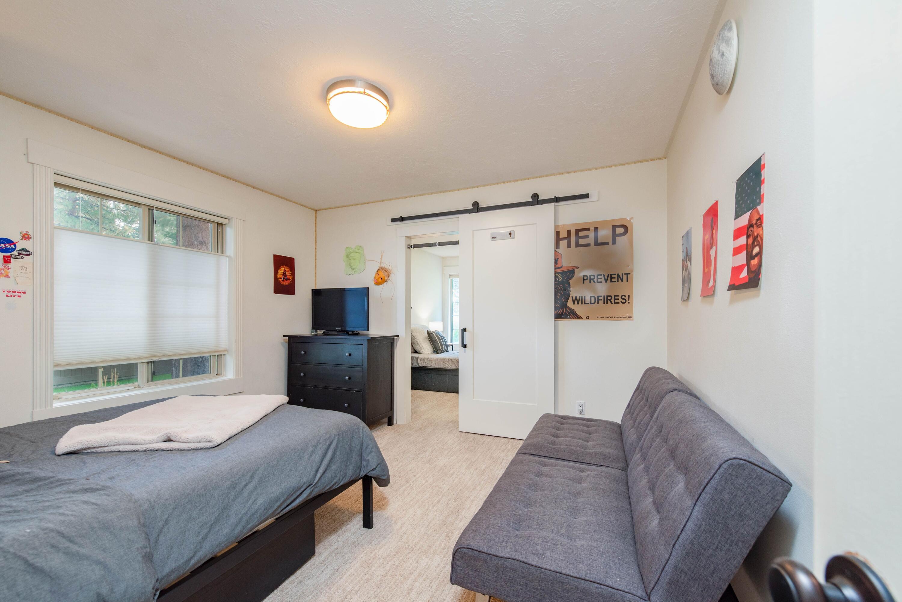 2701 Northwest Strath Way Bend, OR 97703 - Photo 26 of 41 Bedroom 3 with a slider door into bedroom 4