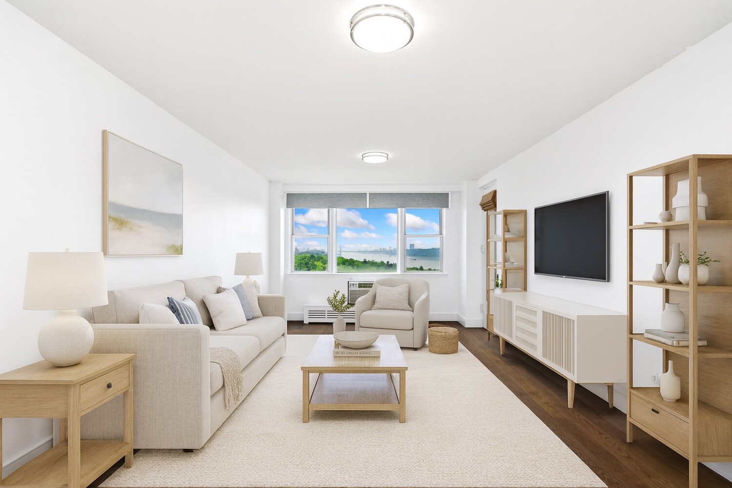 5700 Arlington Avenue, Unit 12T Bronx, NY 10471 - Photo 1 of 39 a living room with furniture and a flat screen tv