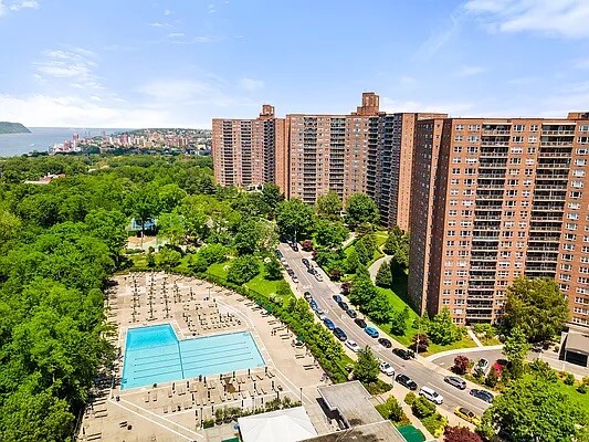 5700 Arlington Avenue, Unit 12T Bronx, NY 10471 - Photo 27 of 39 a view of a city with tall buildings