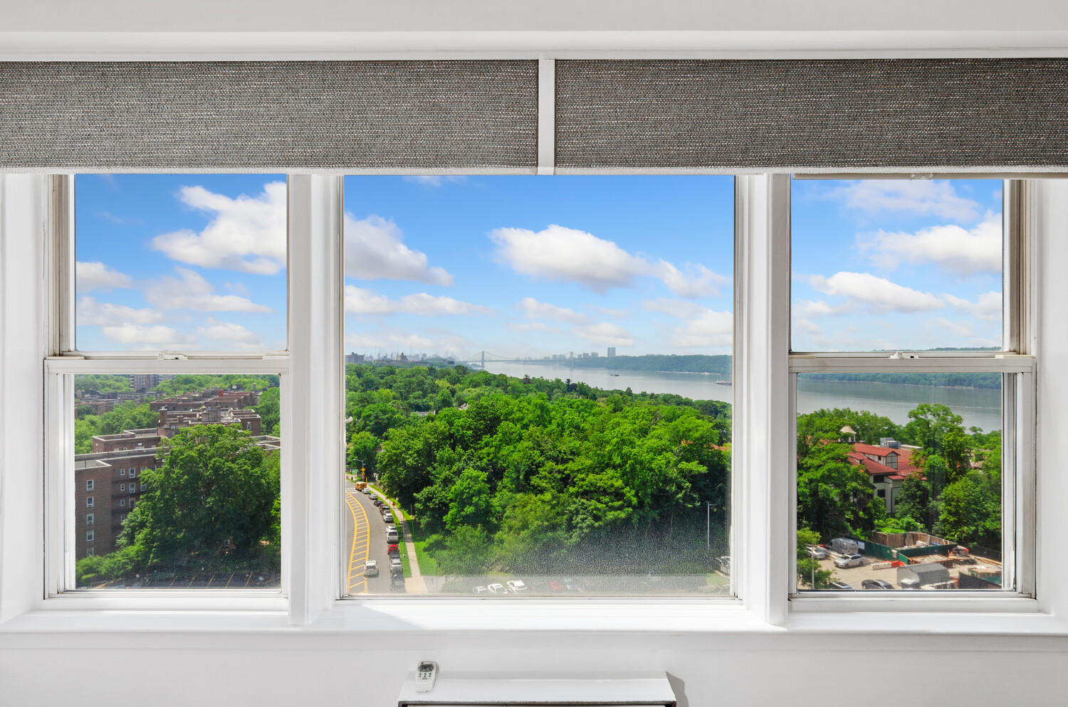 5700 Arlington Avenue, Unit 12T Bronx, NY 10471 - Photo 7 of 39 a view of a door and a living room