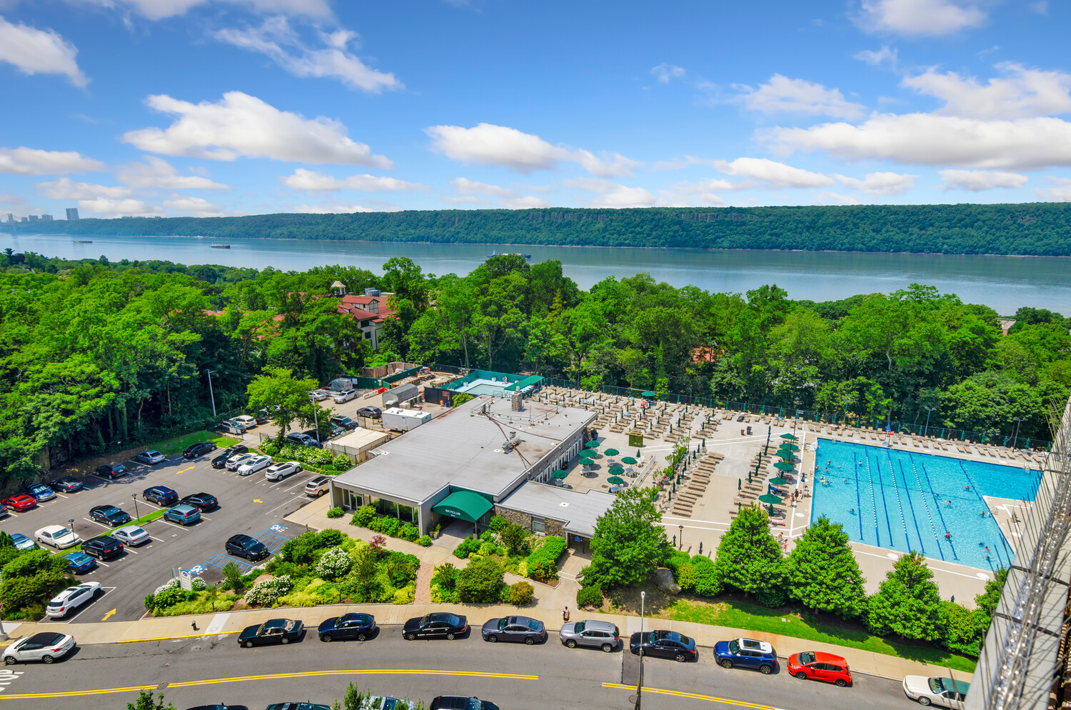 5700 Arlington Avenue, Unit 12T Bronx, NY 10471 - Photo 9 of 39 a view of yard with swimming pool and seating space